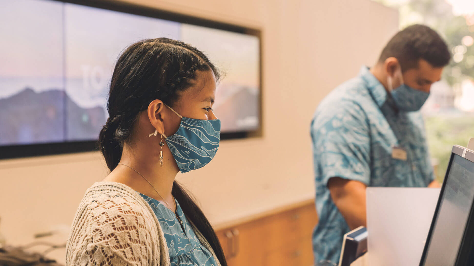 branch tellers with masks on