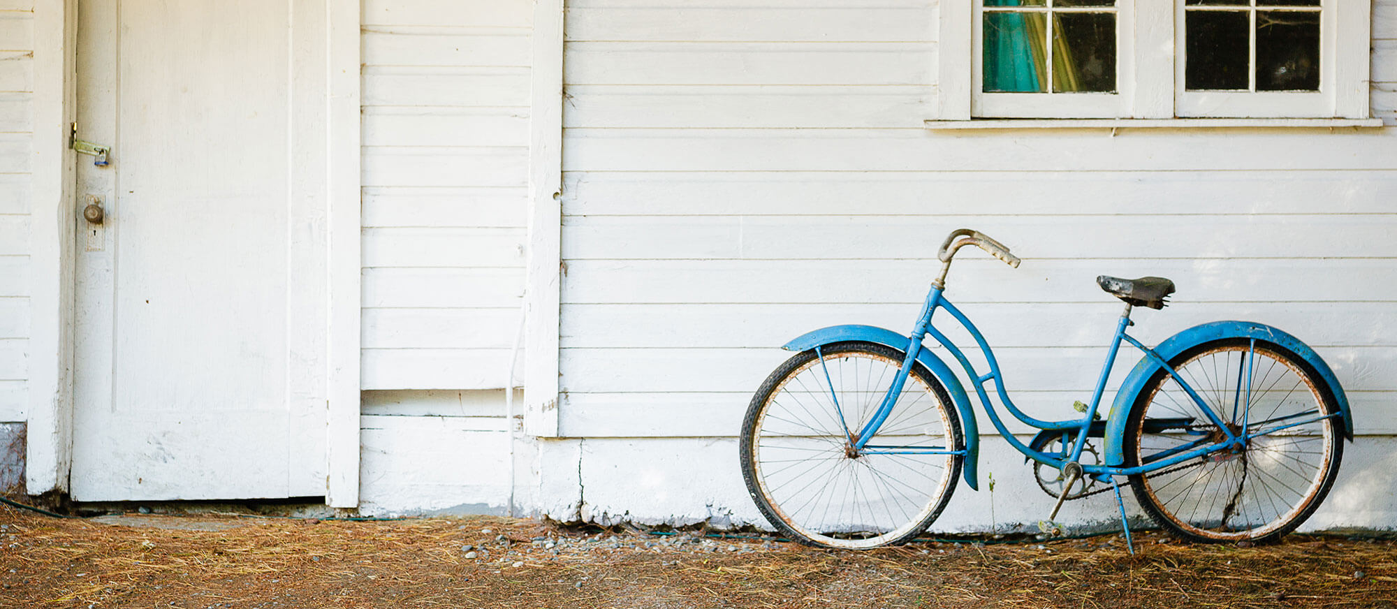 bicycle in front of a house