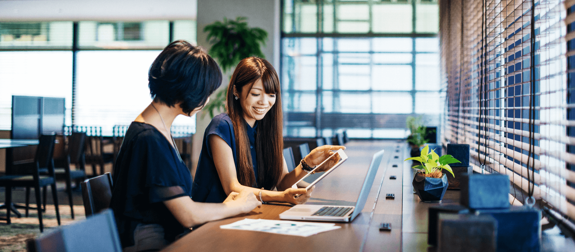 two people reviewing finances