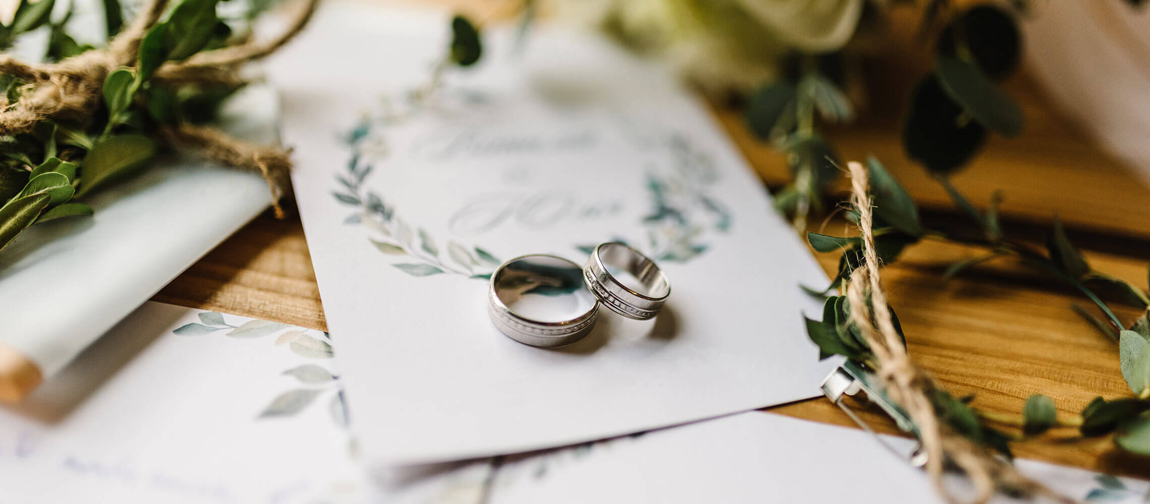 wedding rings on wedding invitation